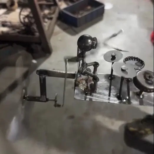 Metal Windmill "Rock Band" — Ignite Your Garden with the Raw Power and Passion of Rocking Motion